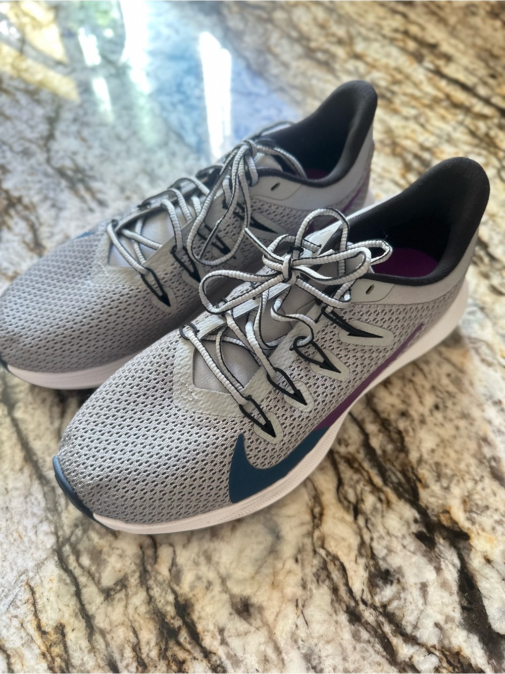 Nike Women's Running Shoes in Light Gray with Blue and Purple Accents